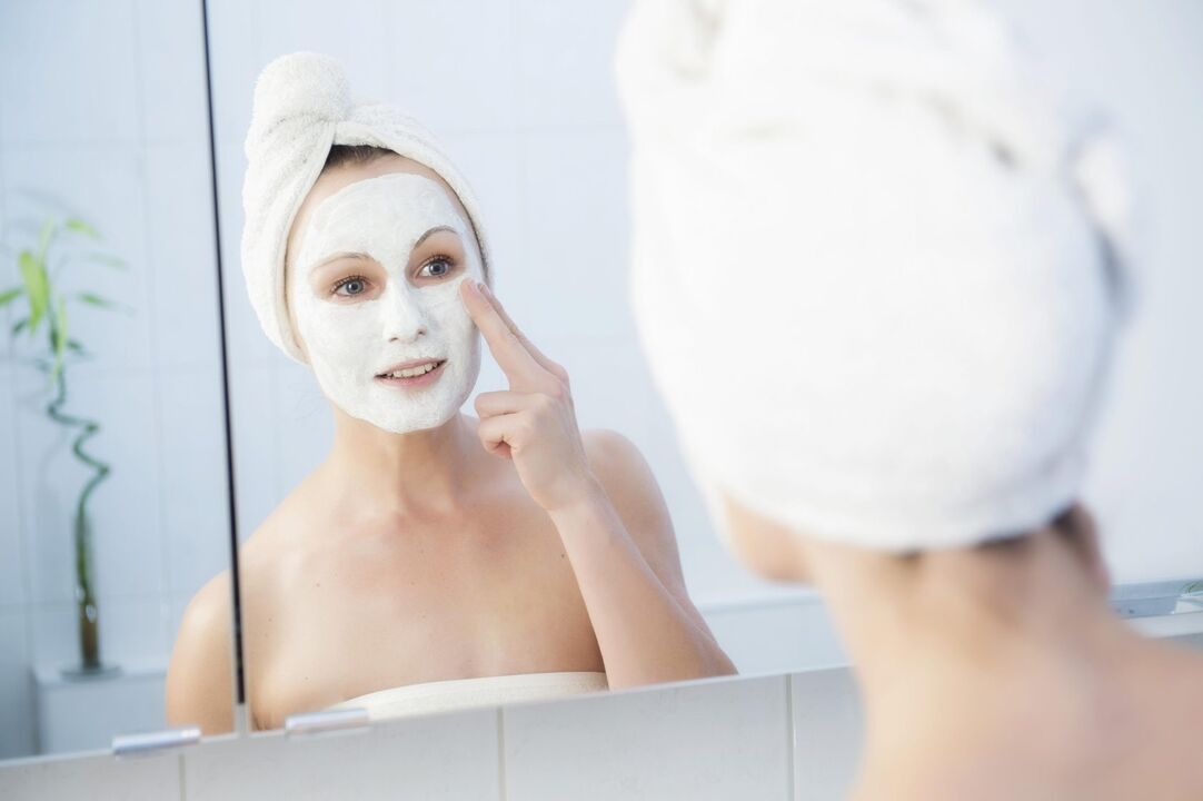 applying a rejuvenating face mask