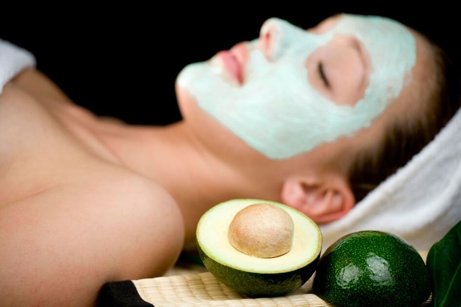 woman applying a rejuvenating mask